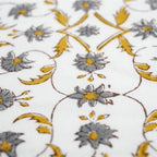 Close-up of hand block print on organic cotton running fabric | Myyra Jaipur
