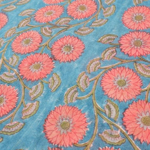 Close-up of hand block print on organic cotton running fabric | Myyra Jaipur