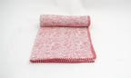 Close-up of hand block print on organic cotton dohar (lightweight cotton quilt) | Myyra Jaipur