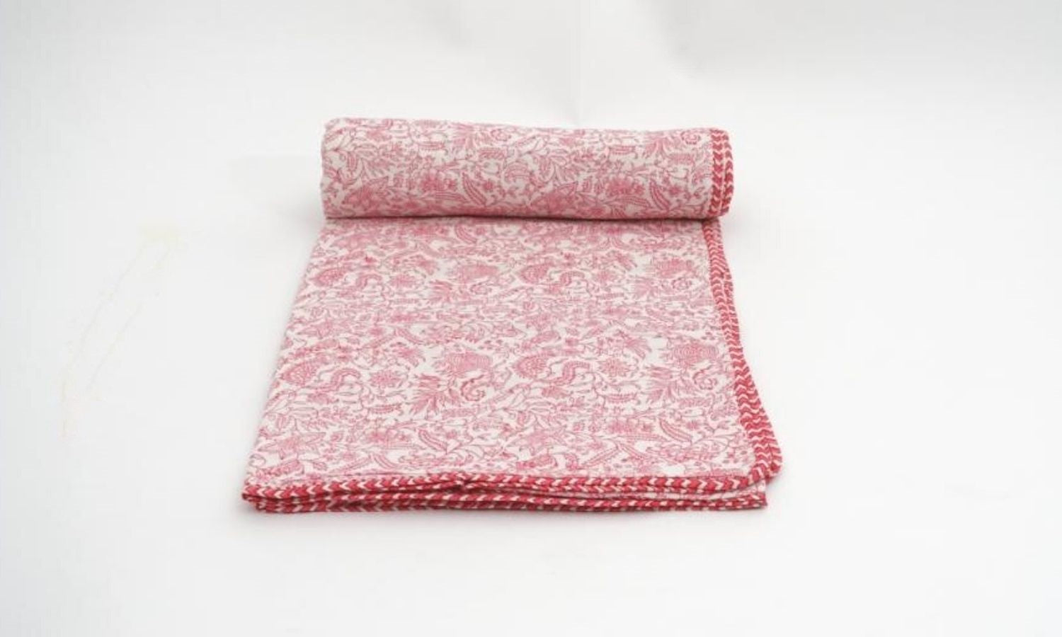 Close-up of hand block print on organic cotton dohar (lightweight cotton quilt) | Myyra Jaipur