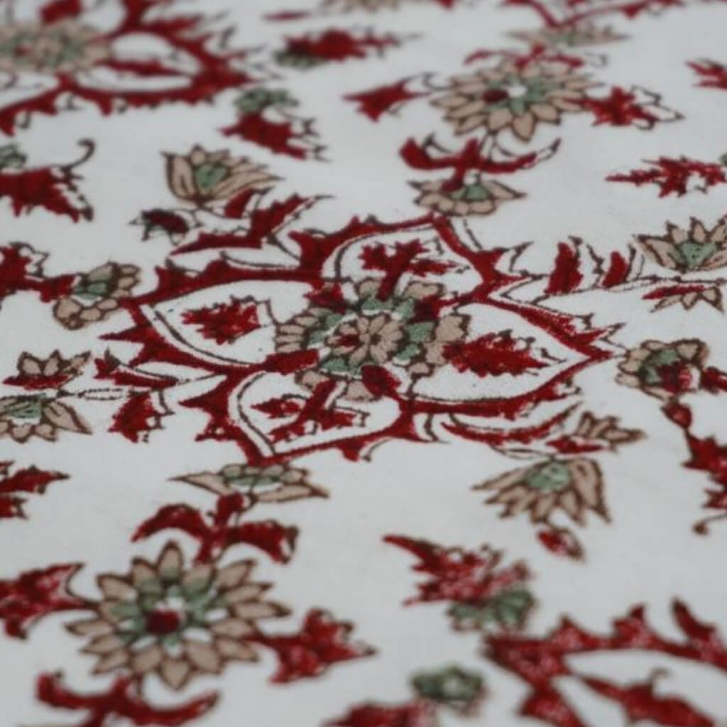 Close-up of hand block print on organic cotton running fabric | Myyra Jaipur