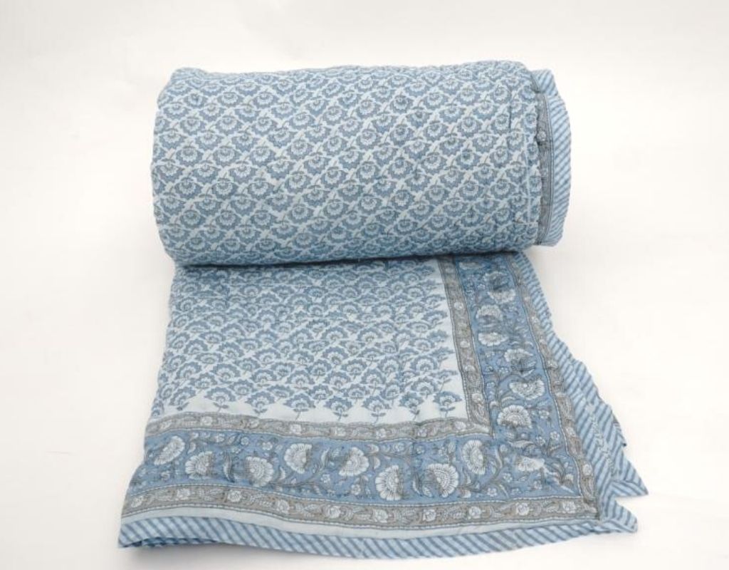 Detail of artisan block print on organic cotton quilt | Myyra Jaipur
