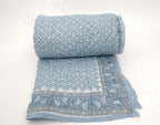 Detail of artisan block print on organic cotton quilt | Myyra Jaipur