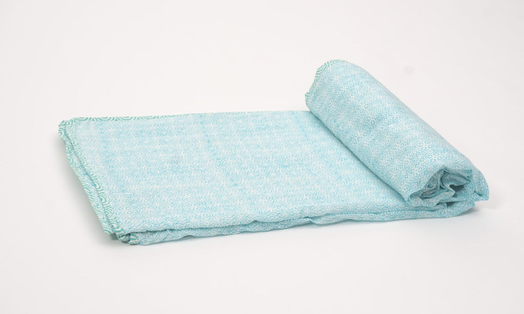 Close-up of hand block print on organic cotton dohar (lightweight cotton quilt) | Myyra Jaipur