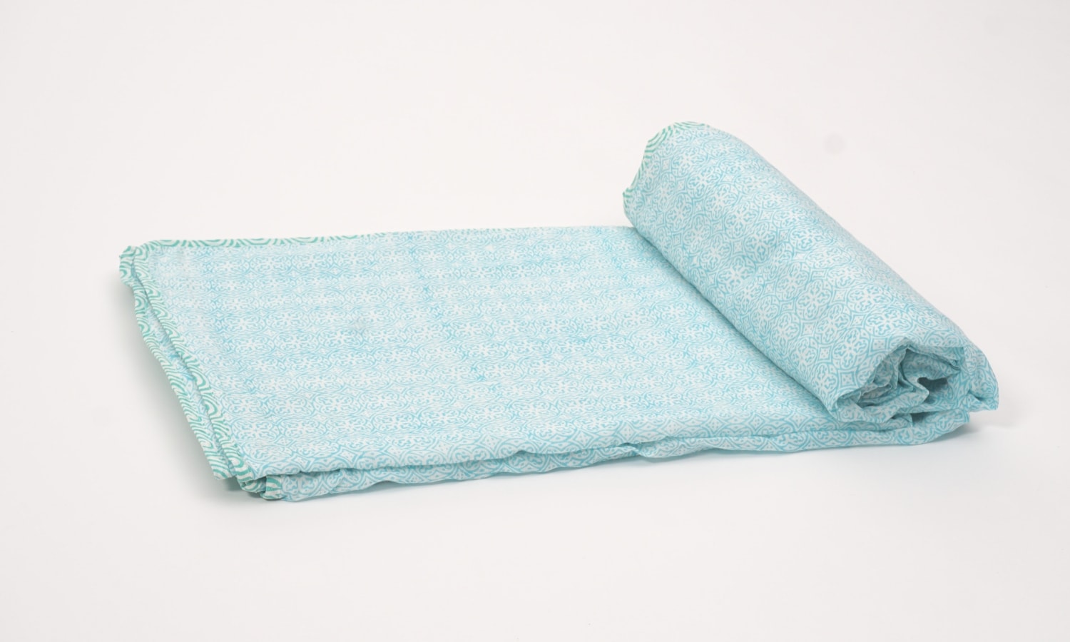 Close-up of hand block print on organic cotton dohar (lightweight cotton quilt) | Myyra Jaipur