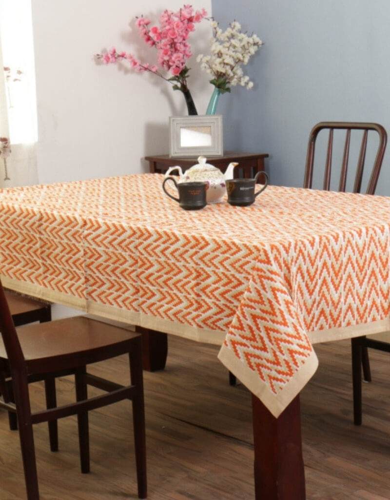 Close-up of ikat hand block print on organic cotton table cover | Myyra Jaipur