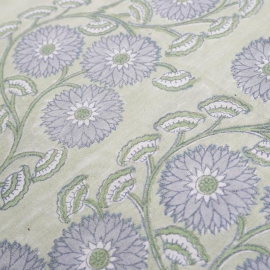 Close-up of hand block print on organic cotton running fabric | Myyra Jaipur