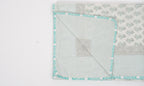 Dohar (lightweight cotton quilt) folded showing pattern repeat of hand block print | Myyra Jaipur