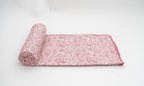Dohar (lightweight cotton quilt) folded showing pattern repeat of hand block print | Myyra Jaipur