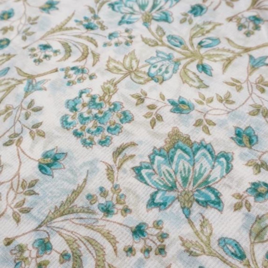 Close-up of hand block print on organic cotton running fabric | Myyra Jaipur
