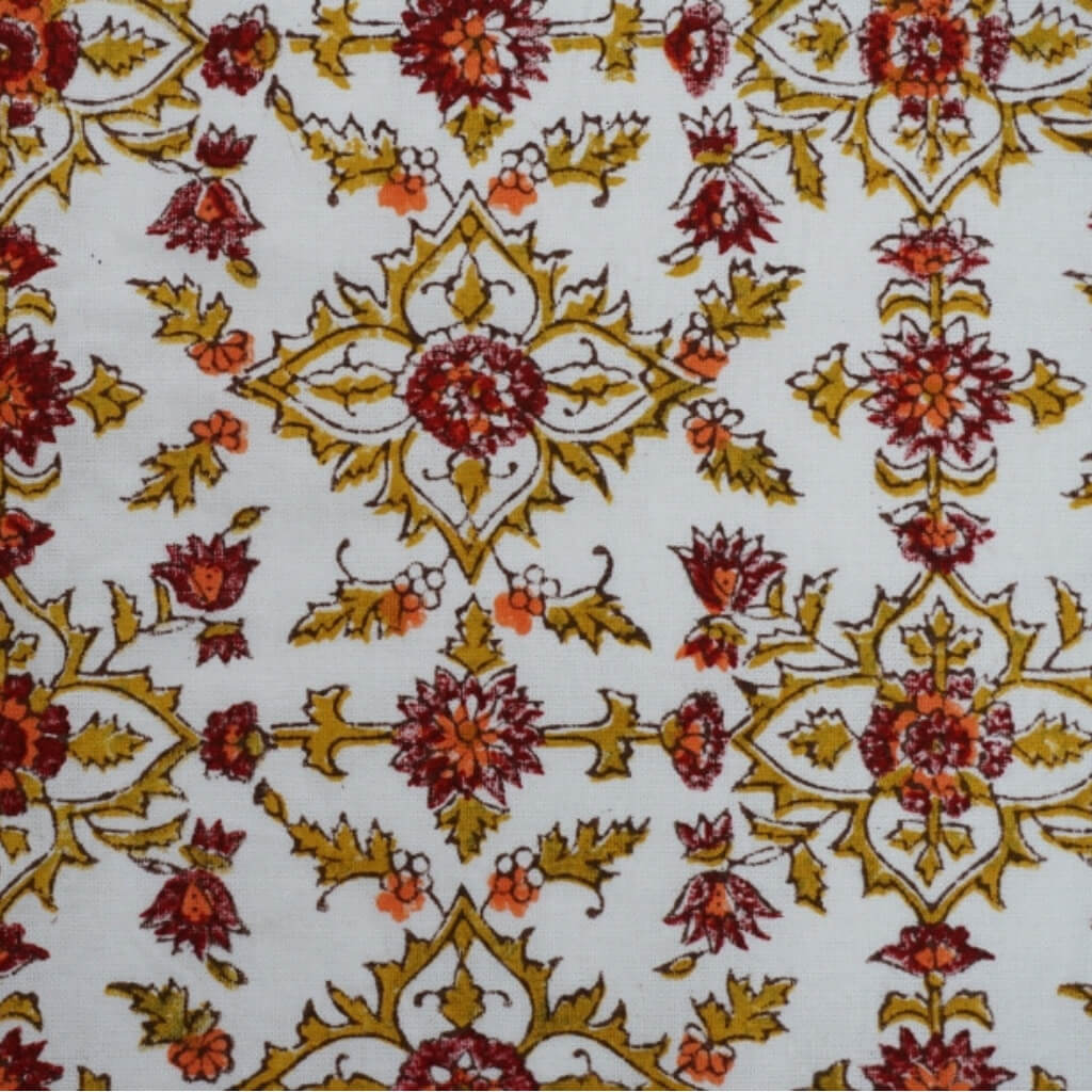 Close-up of hand block print on organic cotton running fabric | Myyra Jaipur