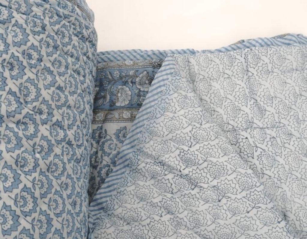 Detail of artisan block print on organic cotton quilt | Myyra Jaipur