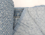 Detail of artisan block print on organic cotton quilt | Myyra Jaipur