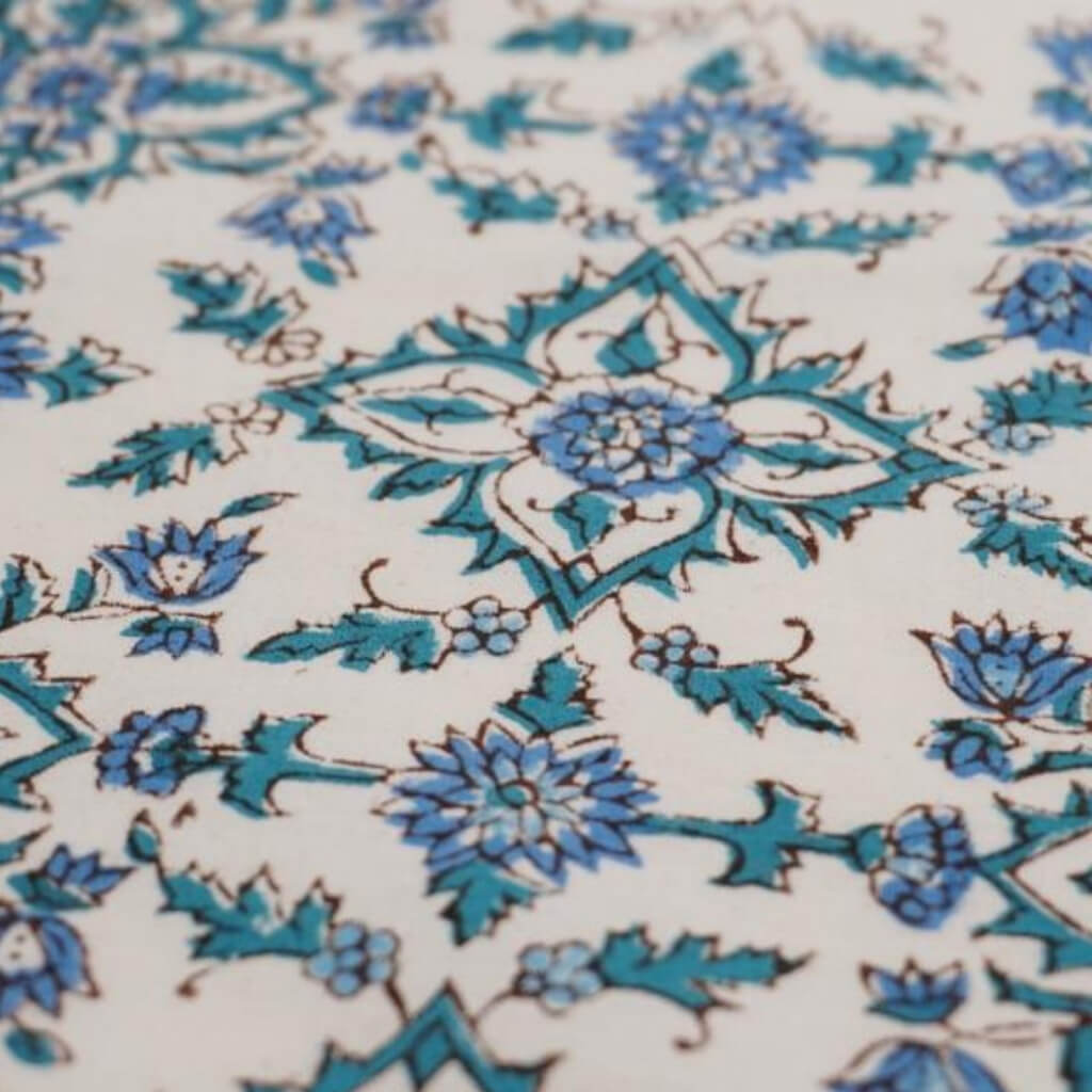 Close-up of hand block print on organic cotton running fabric | Myyra Jaipur