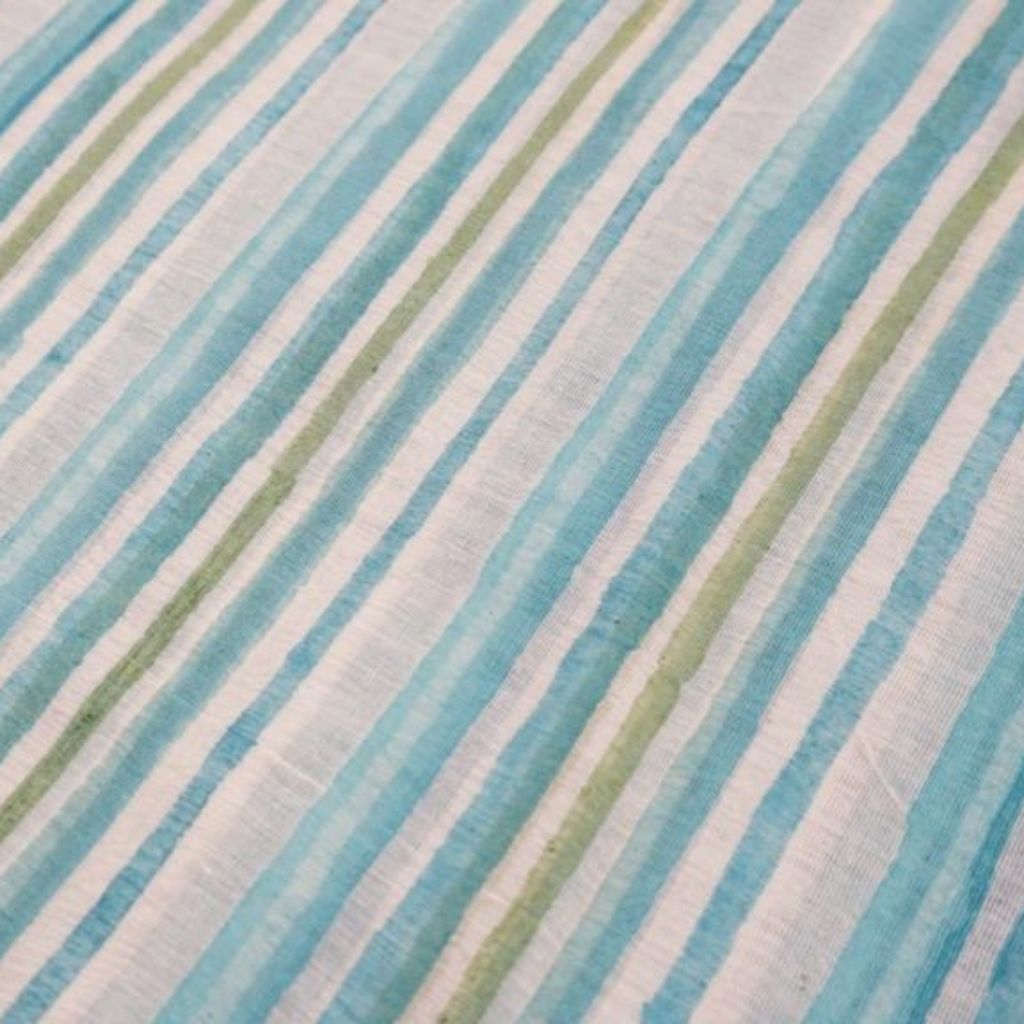 Close-up of hand block print on organic cotton running fabric | Myyra Jaipur