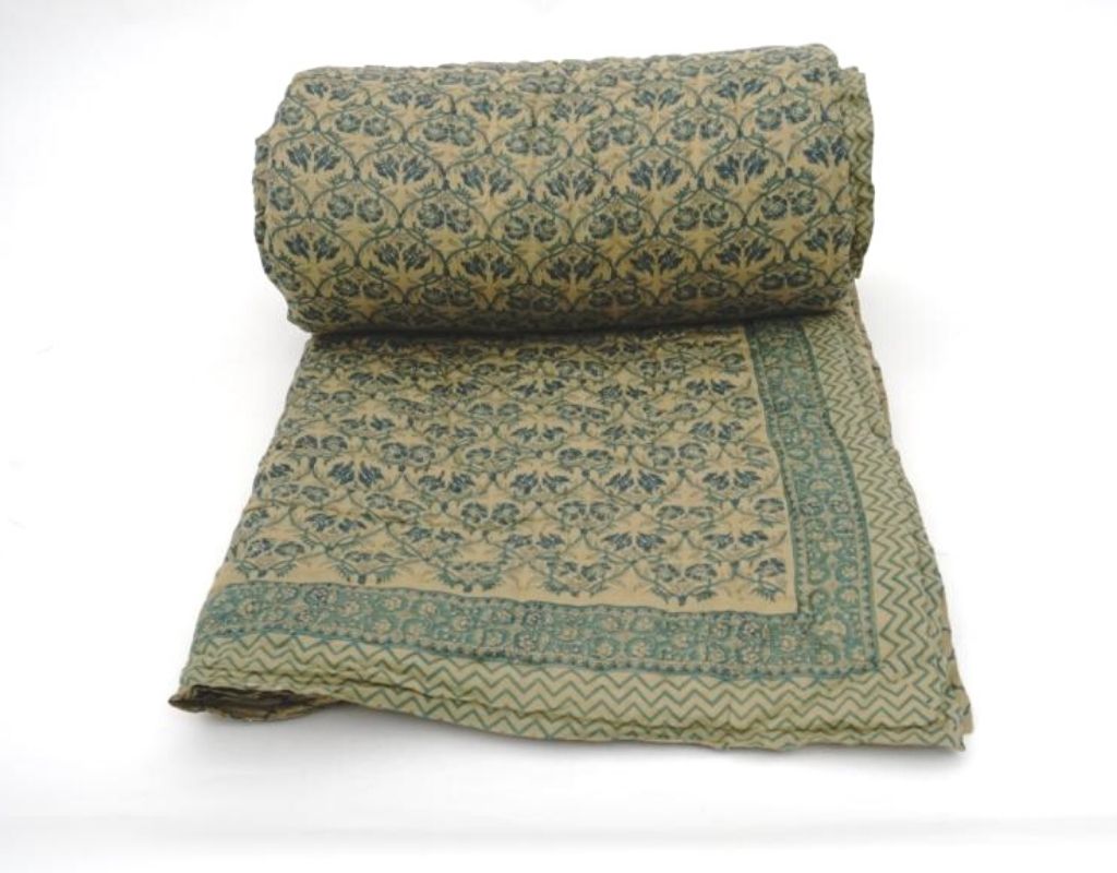 Styled view of hand block printed organic cotton quilt | Myyra Jaipur