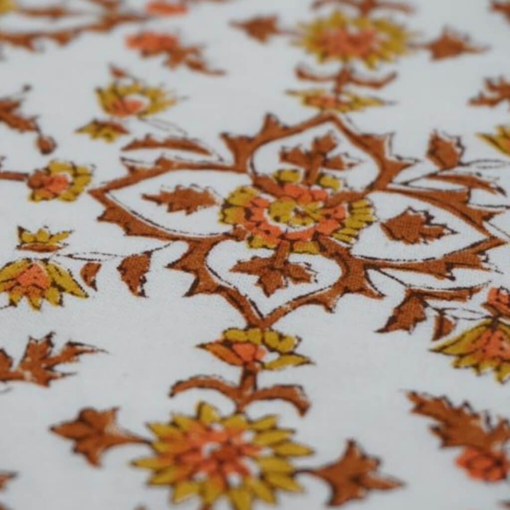 Close-up of hand block print on organic cotton running fabric | Myyra Jaipur