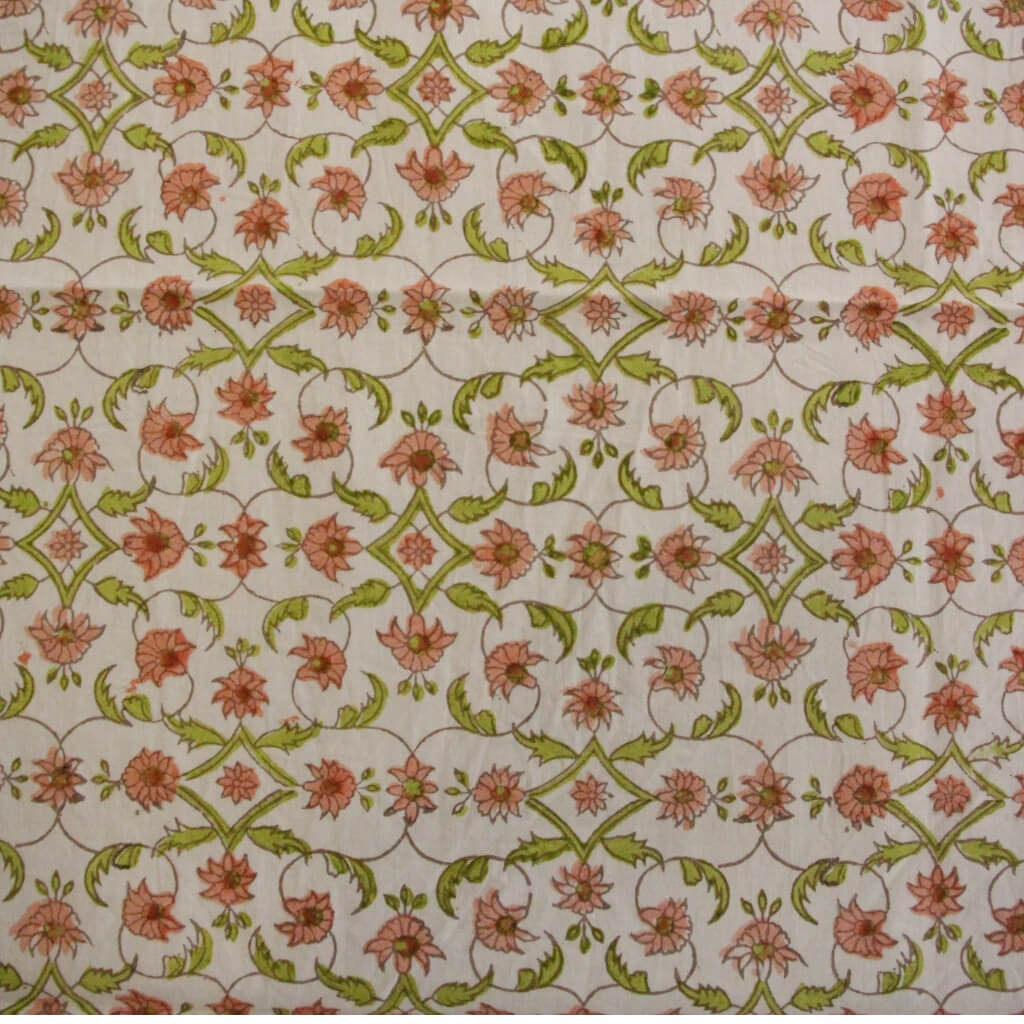 Close-up of hand block print on organic cotton running fabric | Myyra Jaipur