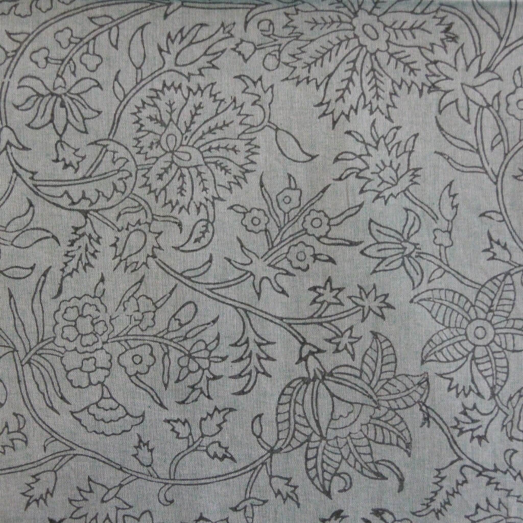Hand block printed organic cotton fabric in styled flat lay | Myyra Jaipur