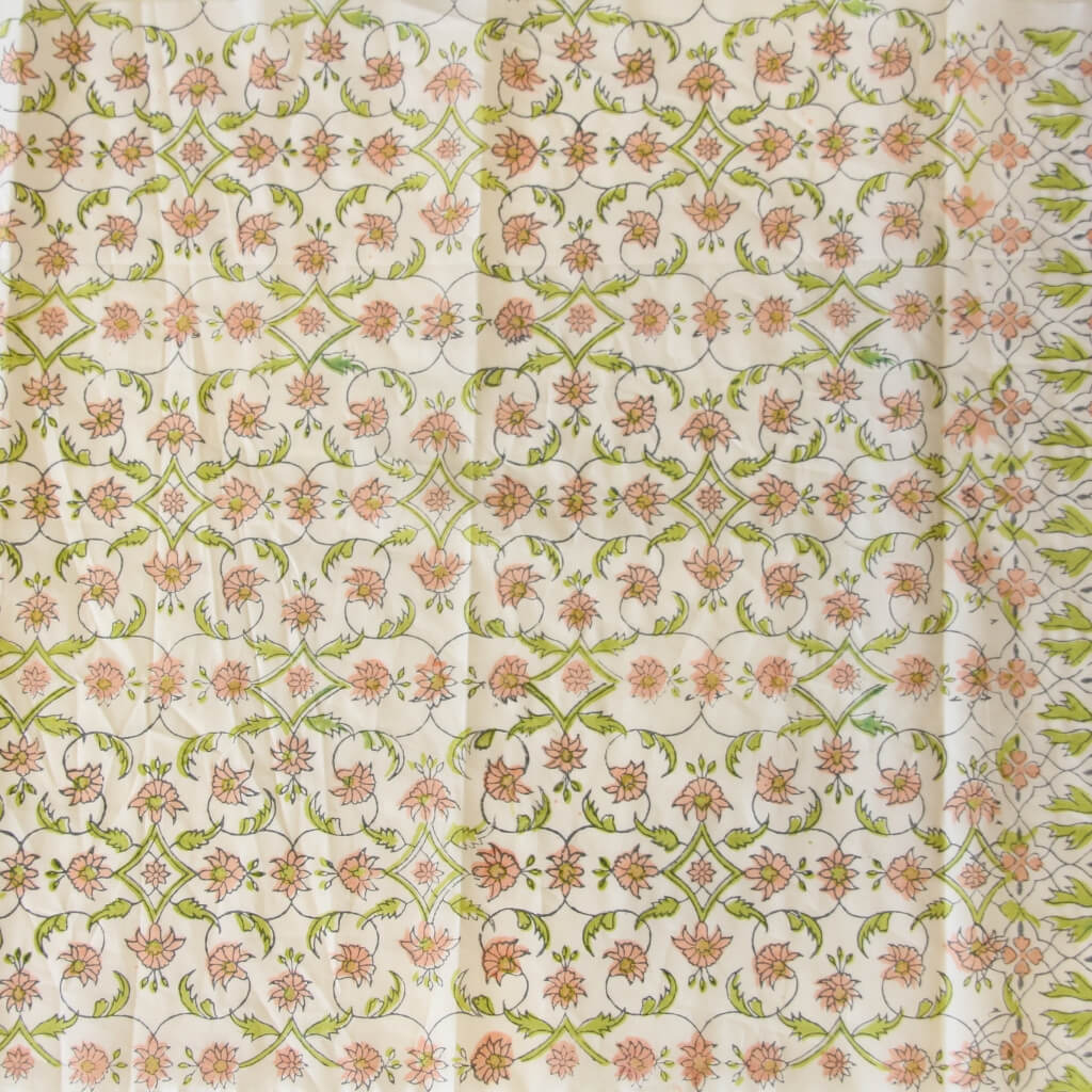 Close-up of hand block print on organic cotton running fabric | Myyra Jaipur