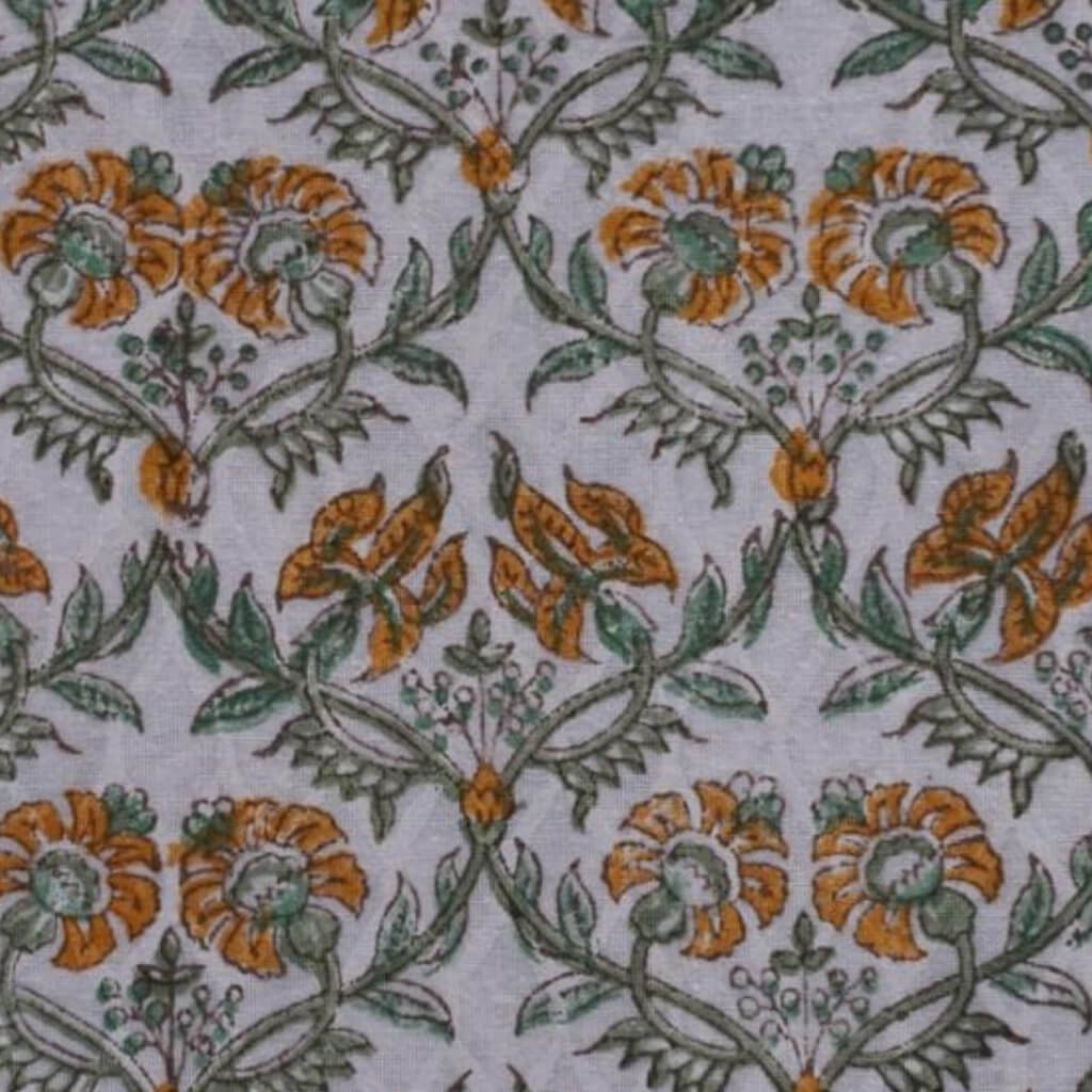Close-up of hand block print on organic cotton running fabric | Myyra Jaipur
