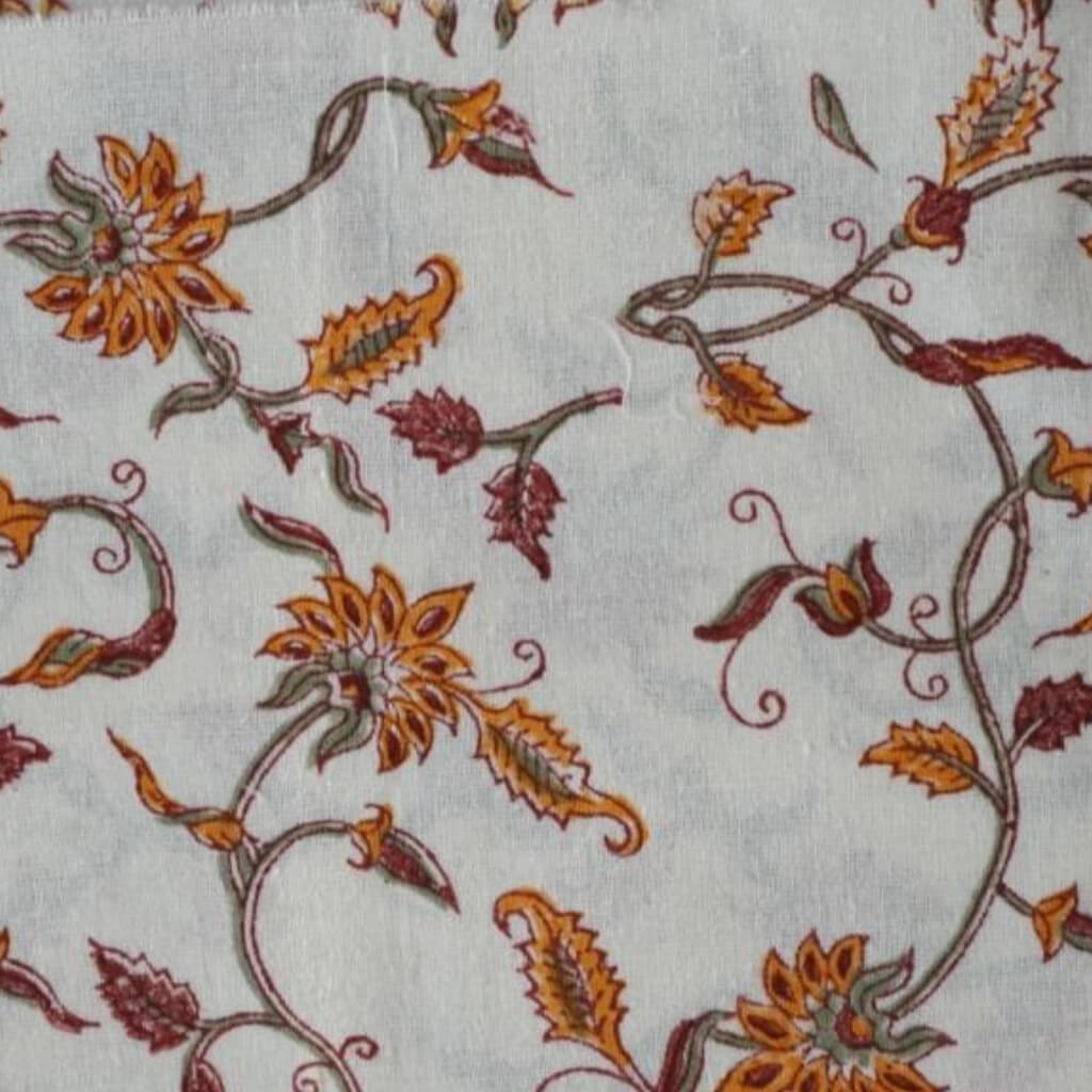 Close-up of hand block print on organic cotton running fabric | Myyra Jaipur