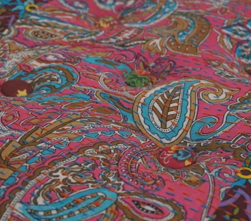 Floor cushion styled view from Myyra Jaipur