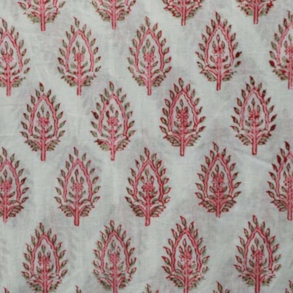Folded hand block printed organic cotton yardage showing pattern repeat | Myyra Jaipur