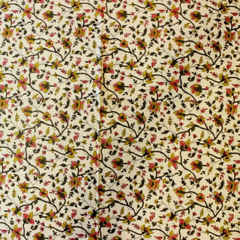 Hand block printed organic cotton fabric in styled flat lay | Myyra Jaipur