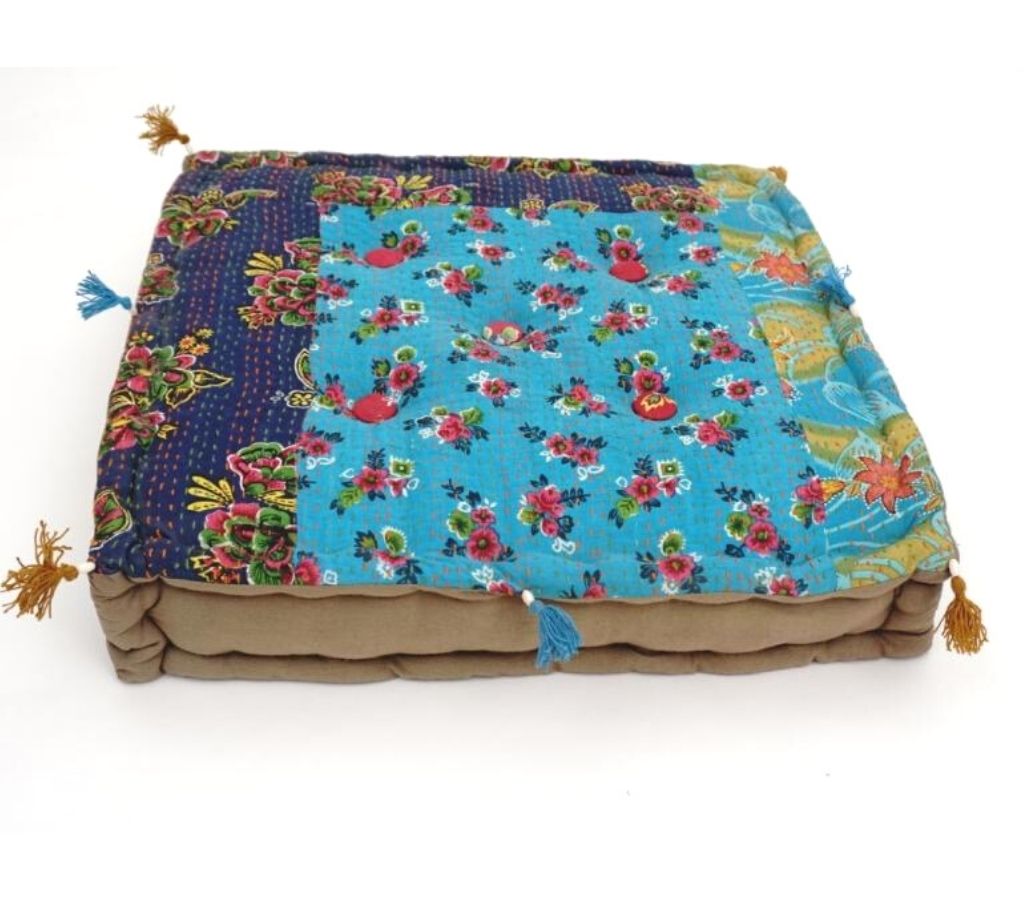 Floor cushion styled view from Myyra Jaipur