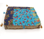 Floor cushion styled view from Myyra Jaipur