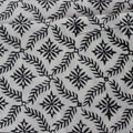 Close-up of hand block print on organic cotton running fabric | Myyra Jaipur