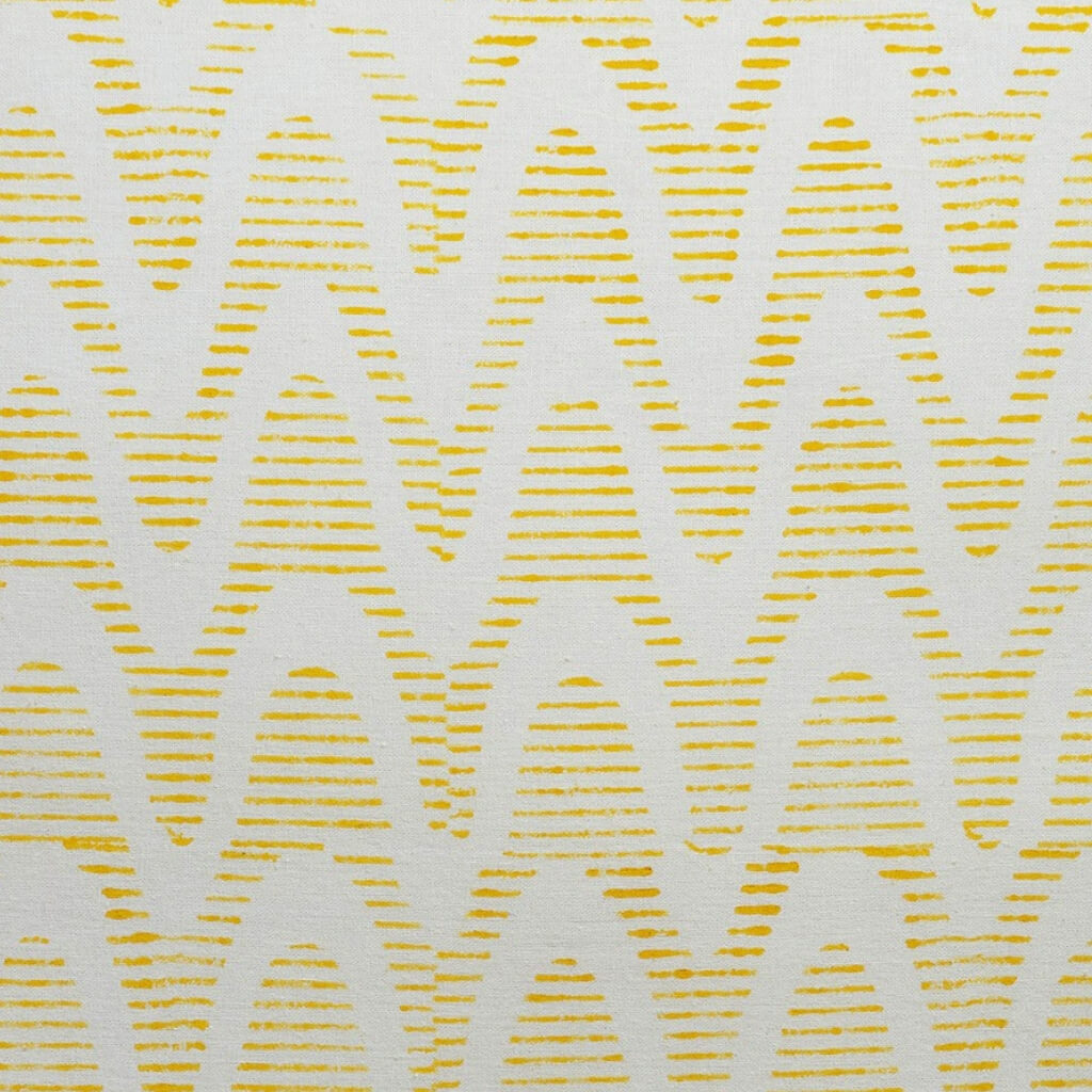 Close-up of hand block print on organic cotton running fabric | Myyra Jaipur