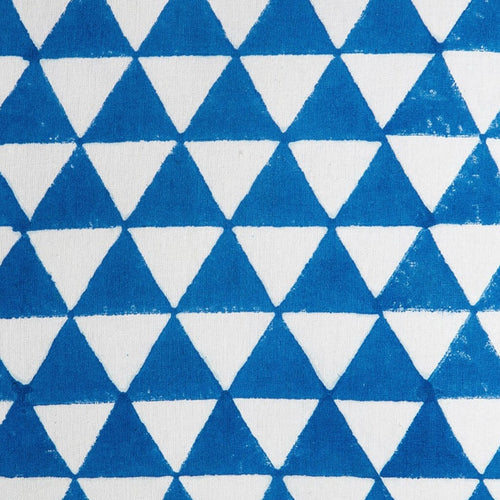 Folded hand block printed organic cotton yardage showing pattern repeat | Myyra Jaipur