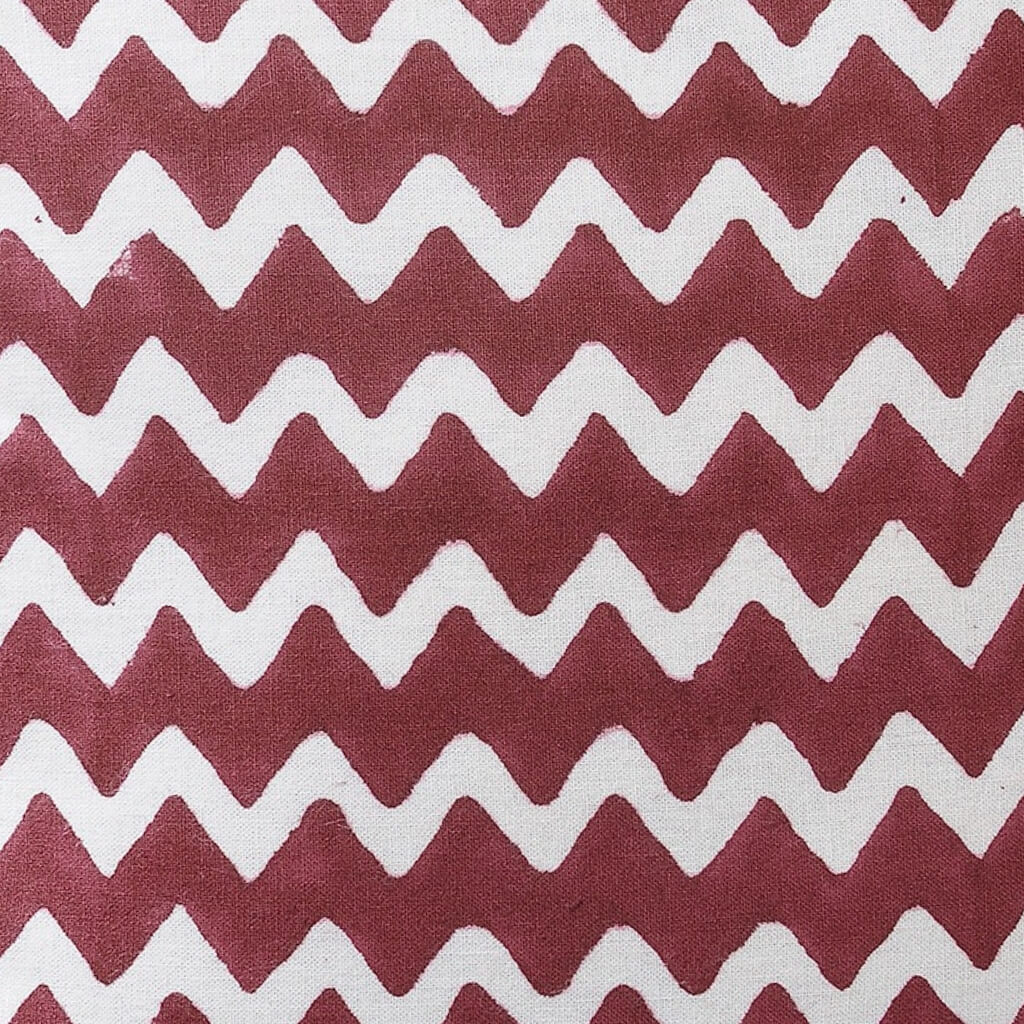 Hand block printed organic cotton fabric in styled flat lay | Myyra Jaipur