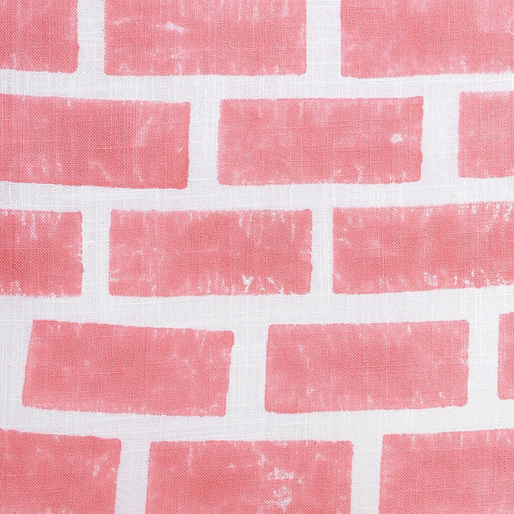 Folded hand block printed organic cotton yardage showing pattern repeat | Myyra Jaipur