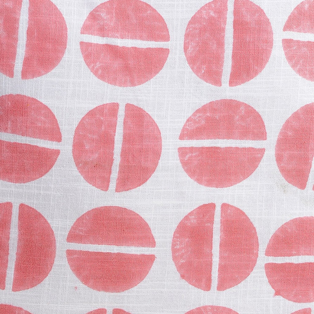 Folded hand block printed organic cotton yardage showing pattern repeat | Myyra Jaipur