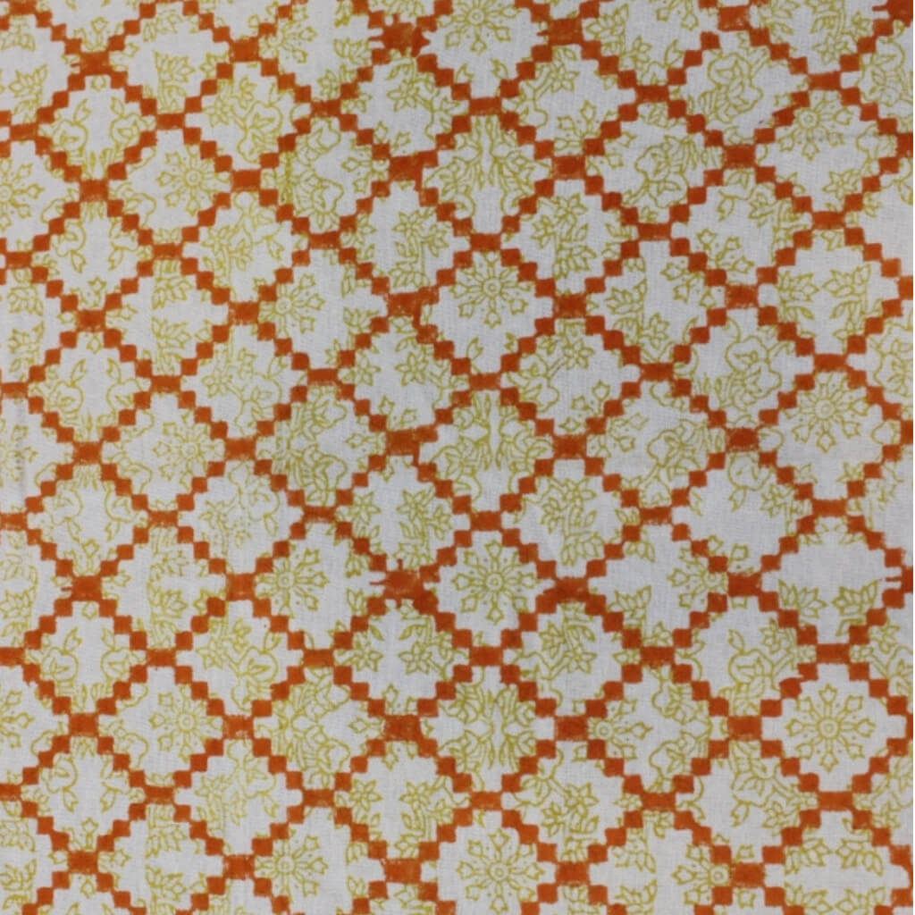 Close-up of hand block print on organic cotton running fabric | Myyra Jaipur