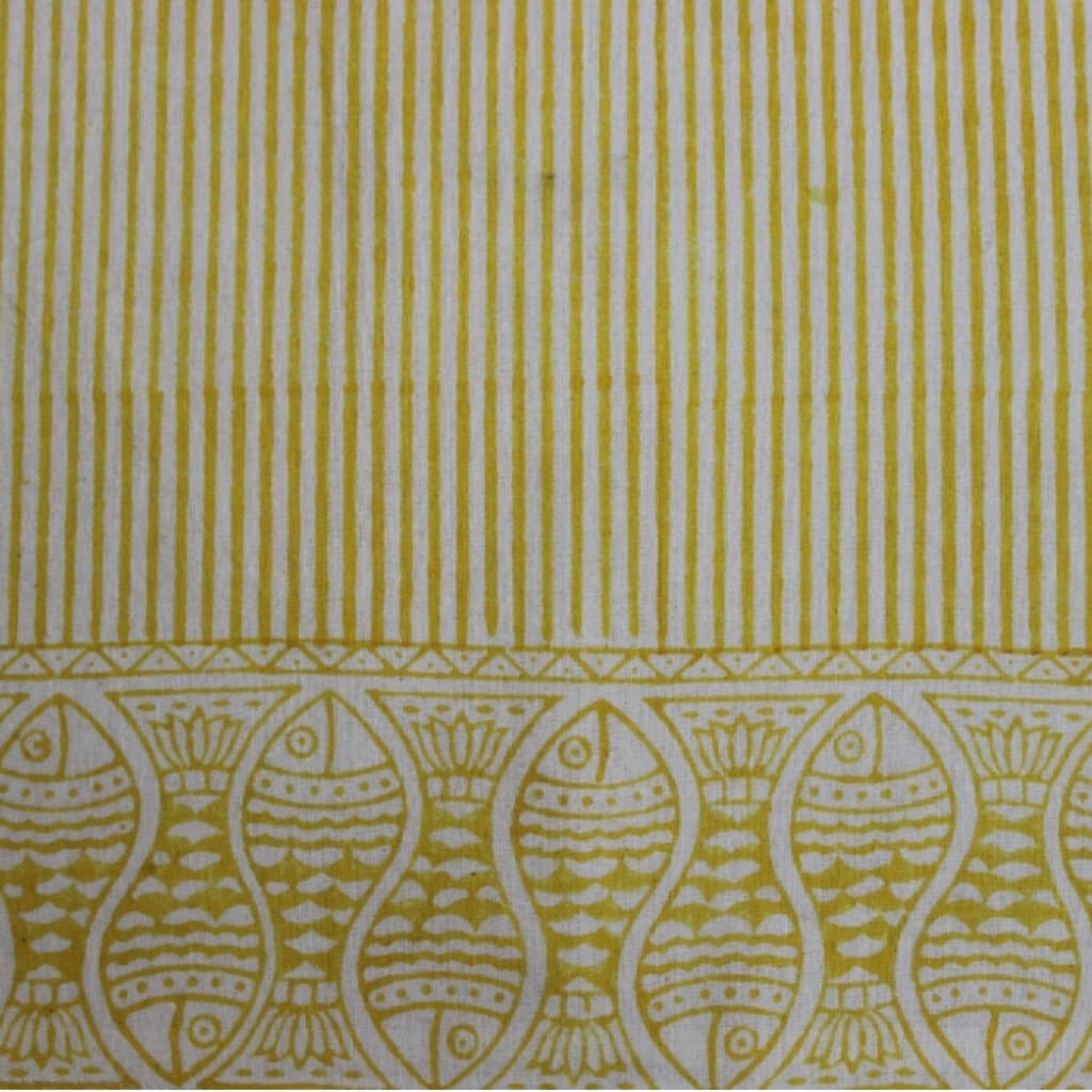 Hand block printed organic cotton fabric in styled flat lay | Myyra Jaipur
