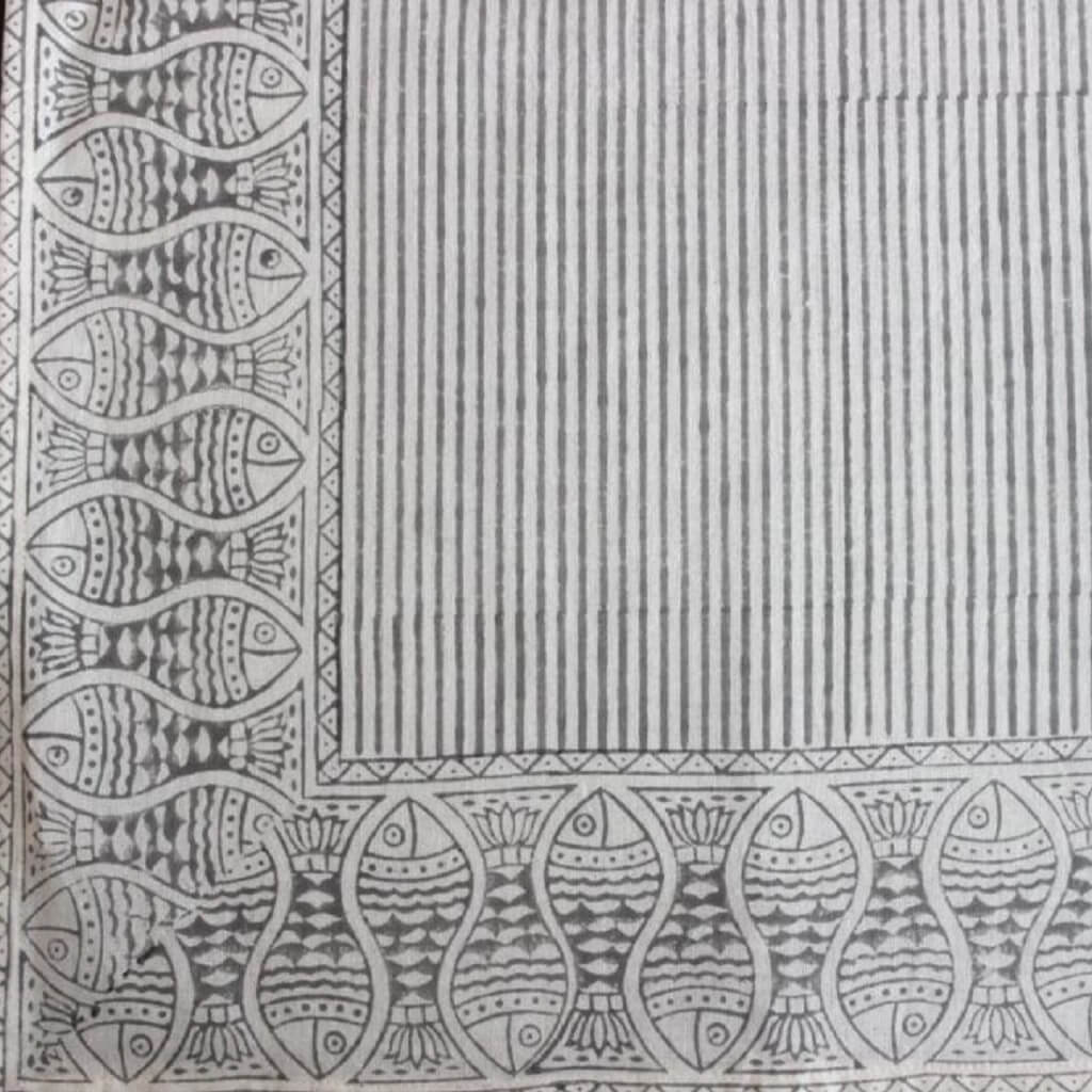 Folded hand block printed organic cotton yardage showing pattern repeat | Myyra Jaipur