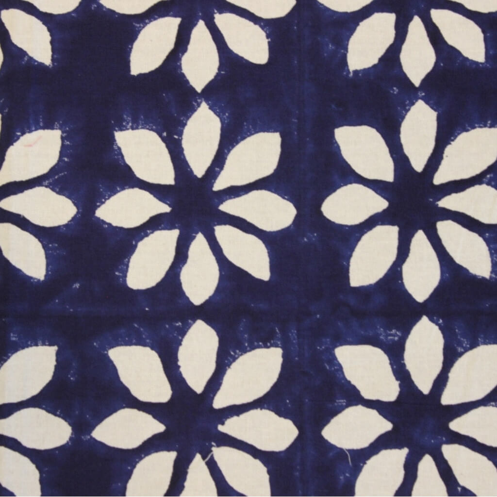 Hand block printed organic cotton fabric in styled flat lay | Myyra Jaipur