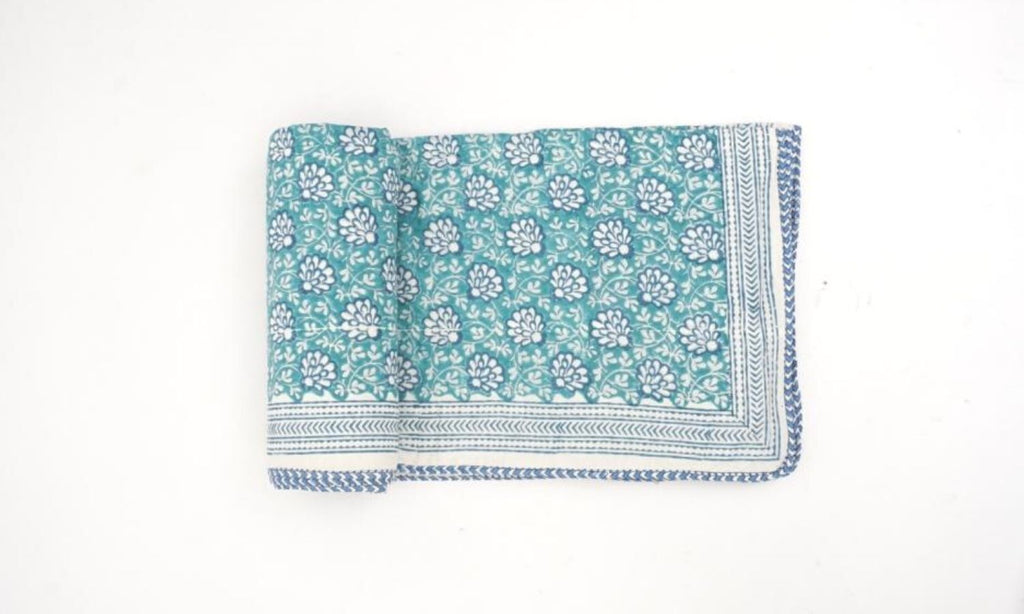 Close-up of hand block print on organic cotton dohar (lightweight cotton quilt) | Myyra Jaipur