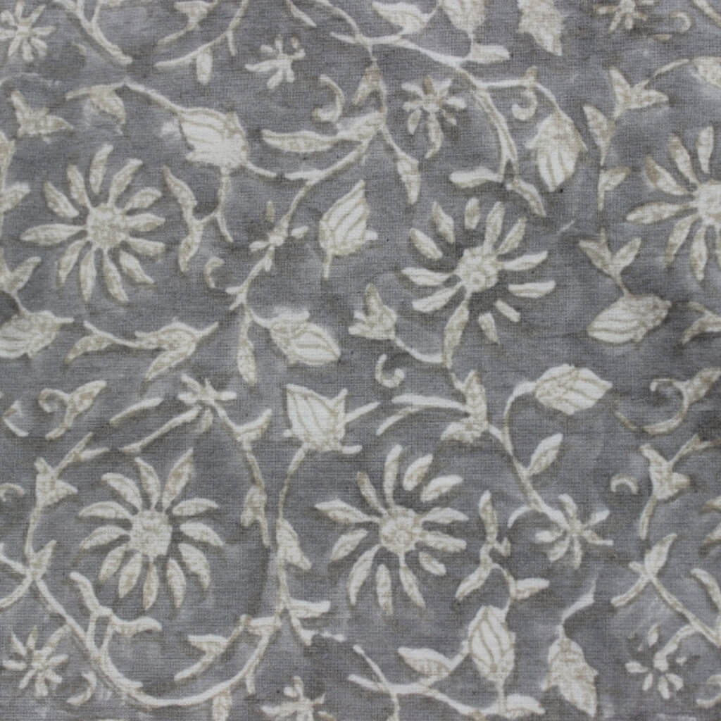 Hand block printed organic cotton fabric in styled flat lay | Myyra Jaipur