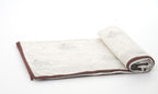 Close-up of hand block print on organic cotton dohar (lightweight cotton quilt) | Myyra Jaipur