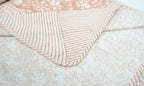 Dohar (lightweight cotton quilt) folded showing pattern repeat of hand block print | Myyra Jaipur