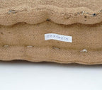 Floor cushion styled view from Myyra Jaipur