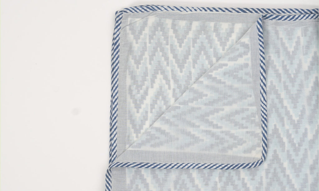 Close-up of hand block print on organic cotton dohar (lightweight cotton quilt) | Myyra Jaipur