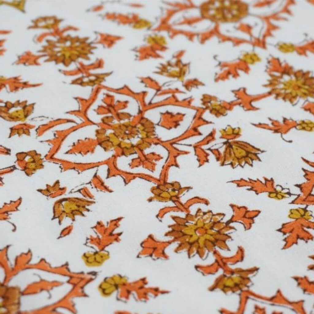 Close-up of hand block print on organic cotton running fabric | Myyra Jaipur