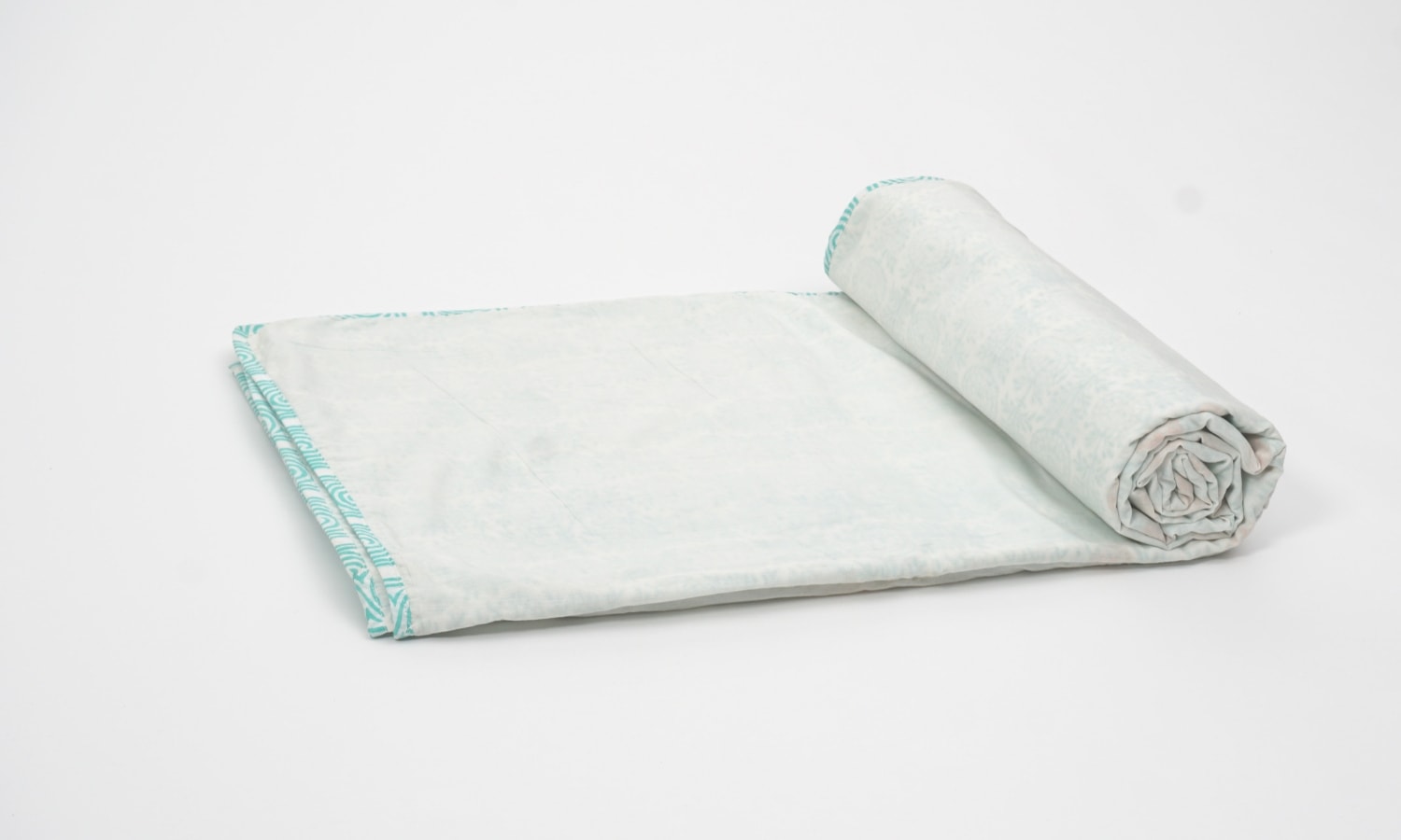 Close-up of hand block print on organic cotton dohar (lightweight cotton quilt) | Myyra Jaipur