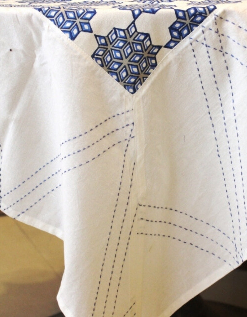 Close-up of kantha hand block print on organic cotton table cover | Myyra Jaipur